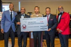 Junior ROTC Cadet White has excelled in every aspect of his JROTC education receives a scholarship